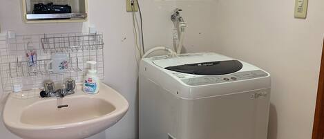 Hair dryer, towels, soap, shampoo