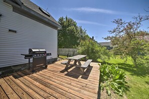 A wooden deck with a grill and picnic table. - Near Lakes, Bay & Trails! Historic Waldoboro Gem (Waldoboro)