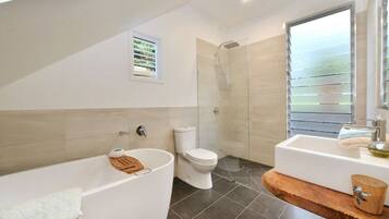 Bathtub, hair dryer, towels