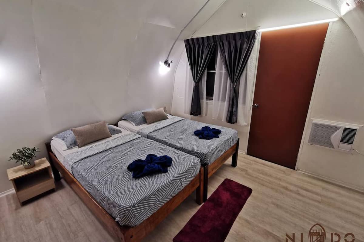 Standaard kamer, gedeelde badkamer | Verduisterende gordijnen, beddengoed