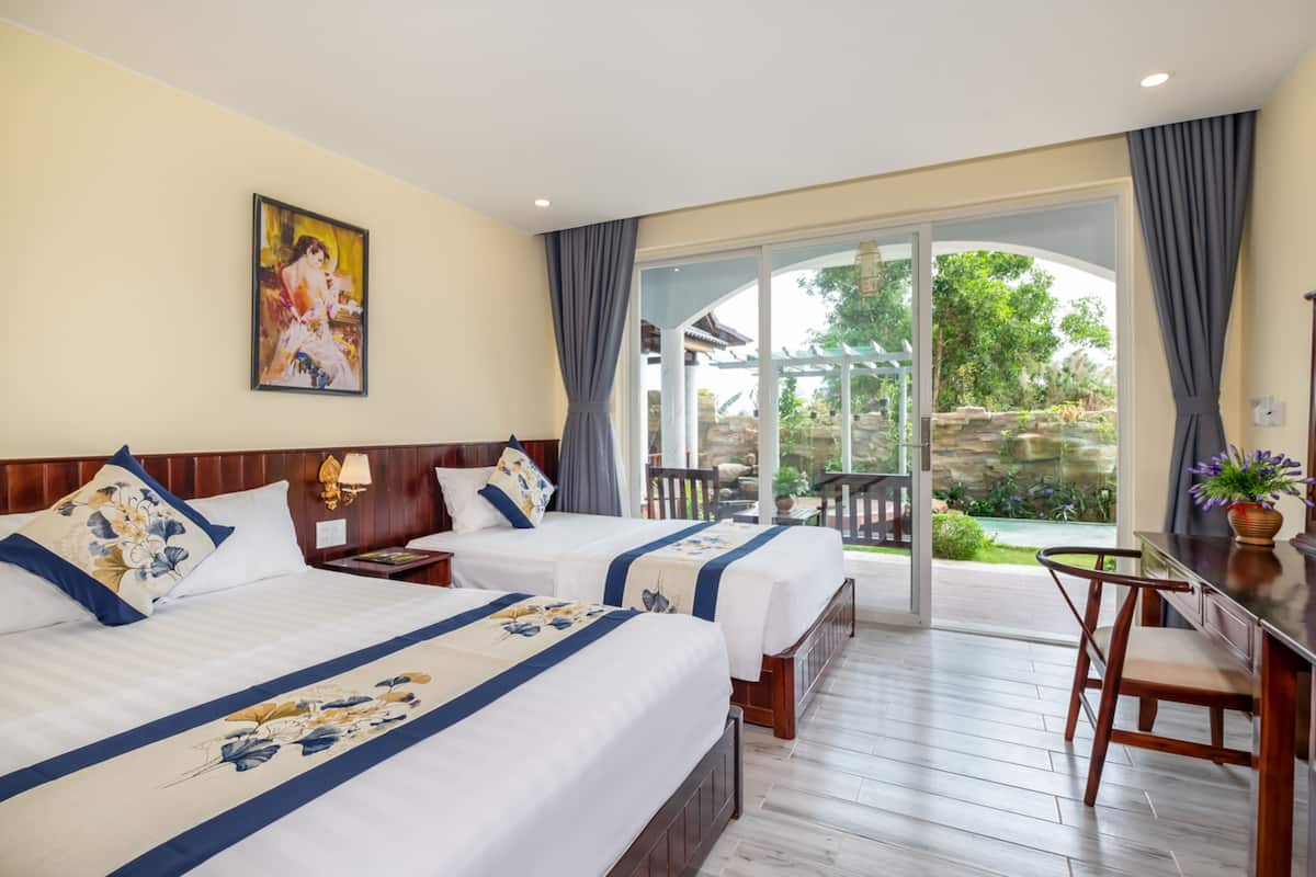 Phòng 2 giường đơn Deluxe, quang cảnh vườn | Minibar, bàn, phòng cách âm, truy cập Internet không dây miễn phí 