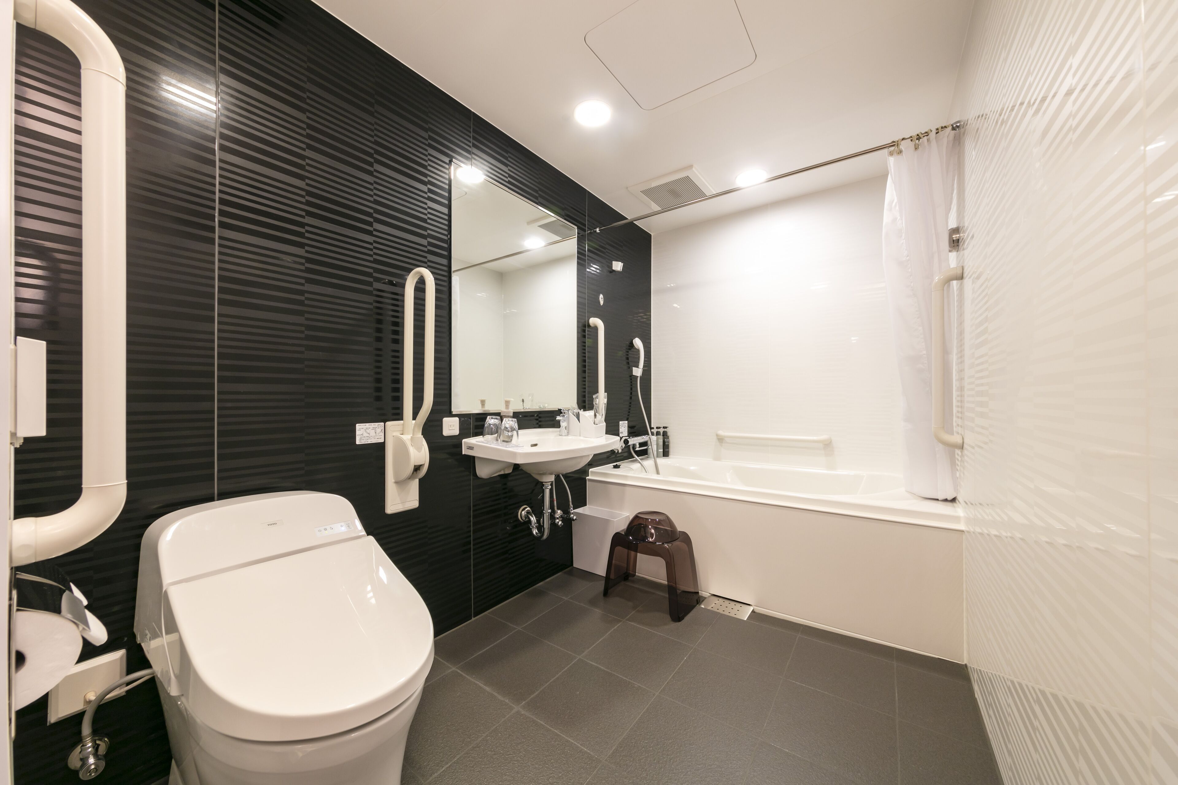 universal room | bathroom | free toiletries, hair dryer, slippers, electronic bidet