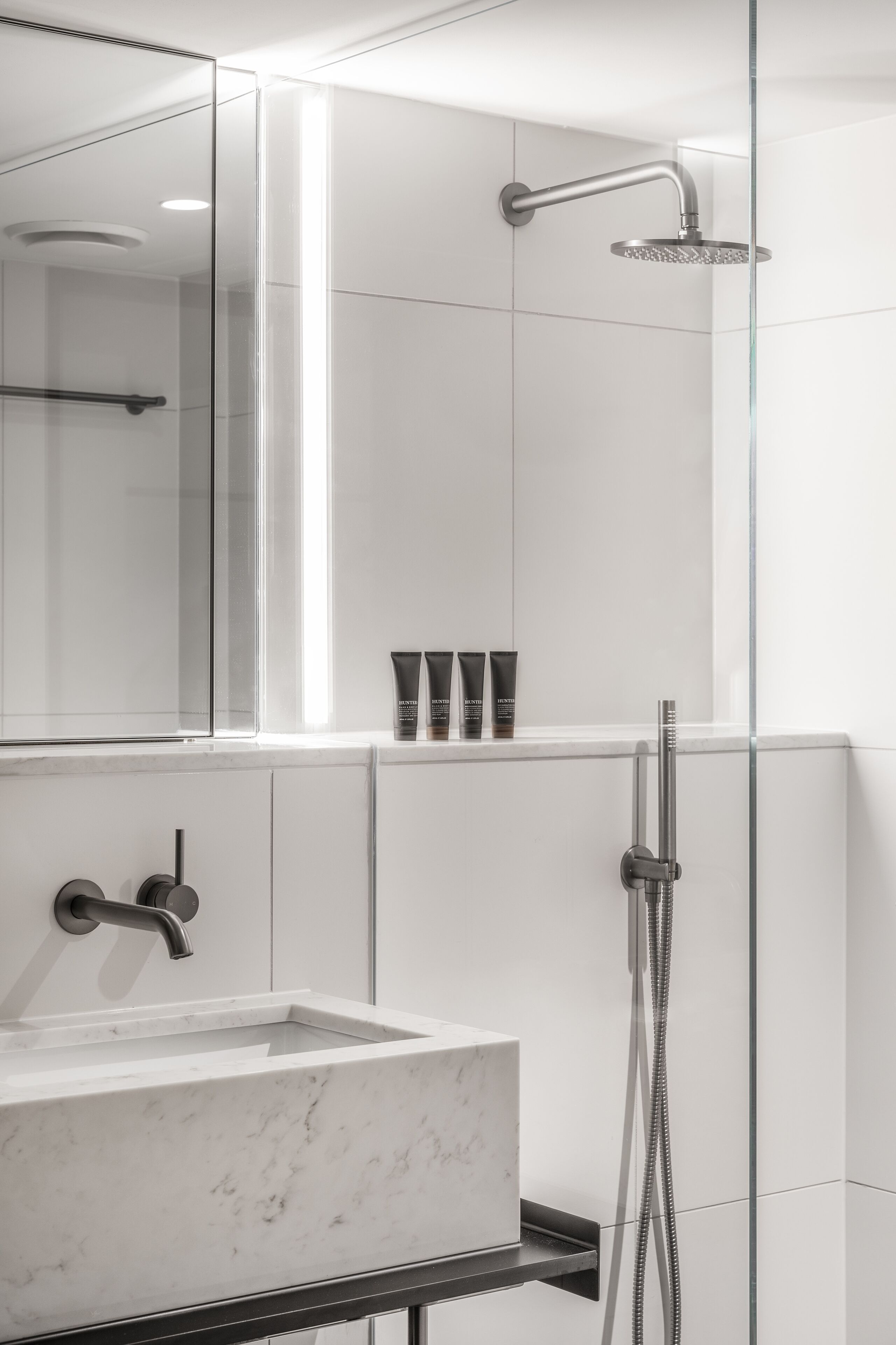 shower, rainfall showerhead, designer toiletries, hair dryer