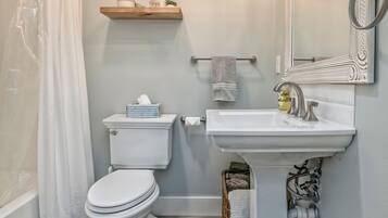 Combined shower/bathtub, hair dryer, towels, soap