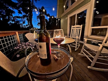 Outdoor Private Deck. Firepit and dining area