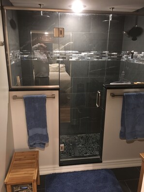 Combined shower/tub, hair dryer, towels, soap