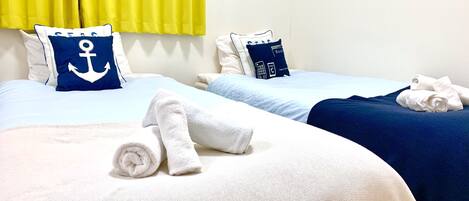 3 bedrooms, blackout curtains, iron/ironing board, free cots/infant beds