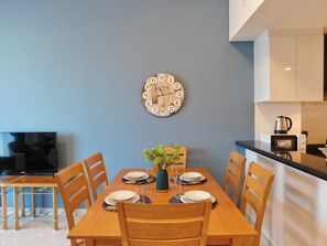 Appartement Deluxe, 1 chambre | Repas dans la chambre