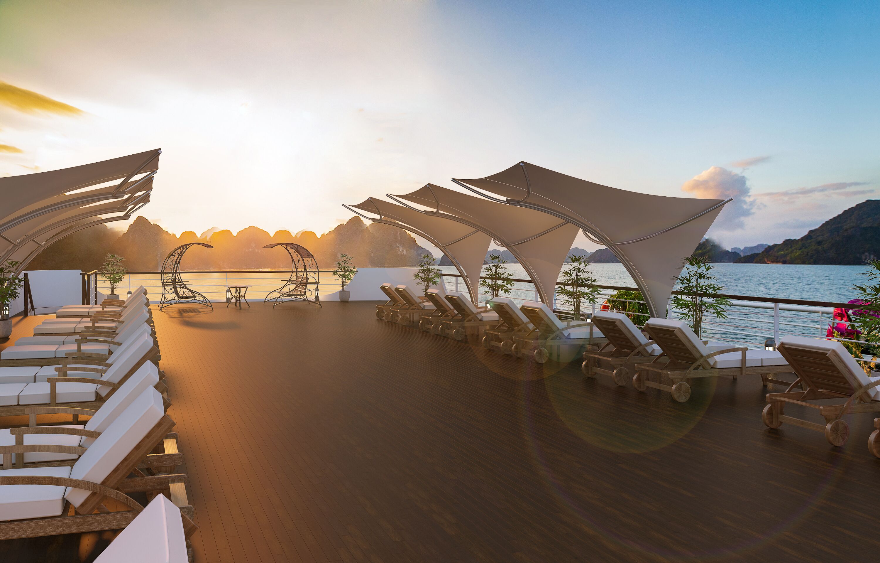 Een zonnig terras met lounge stoelen en parasols, met uitzicht op een wateroppervlak en bergen.