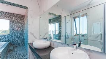 Premier Villa | Bathroom | Rainfall showerhead, hair dryer, bidet, towels