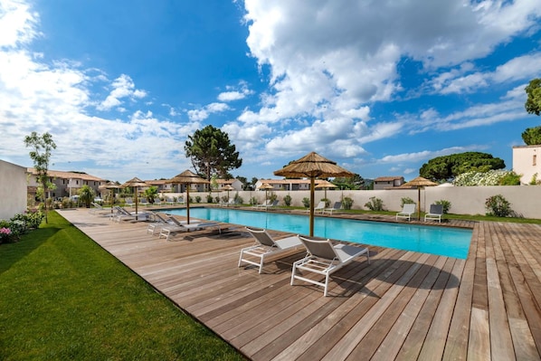 Outdoor pool, a heated pool, sun loungers