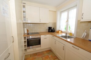 Fridge, microwave, high chair