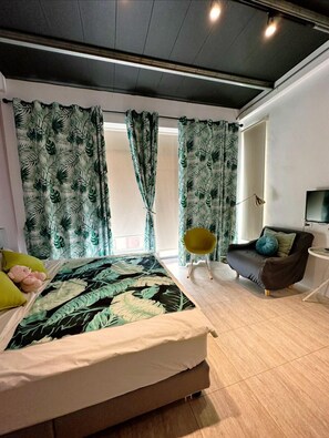 Habitación Deluxe doble | 1 dormitorio, cortinas opacas, sistema de insonorización y wifi gratis