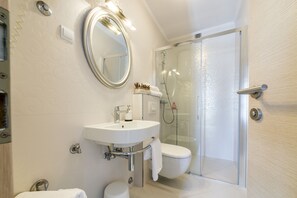 Apartment, 1 Bedroom, Pool View | Bathroom | Shower, hair dryer, towels, soap