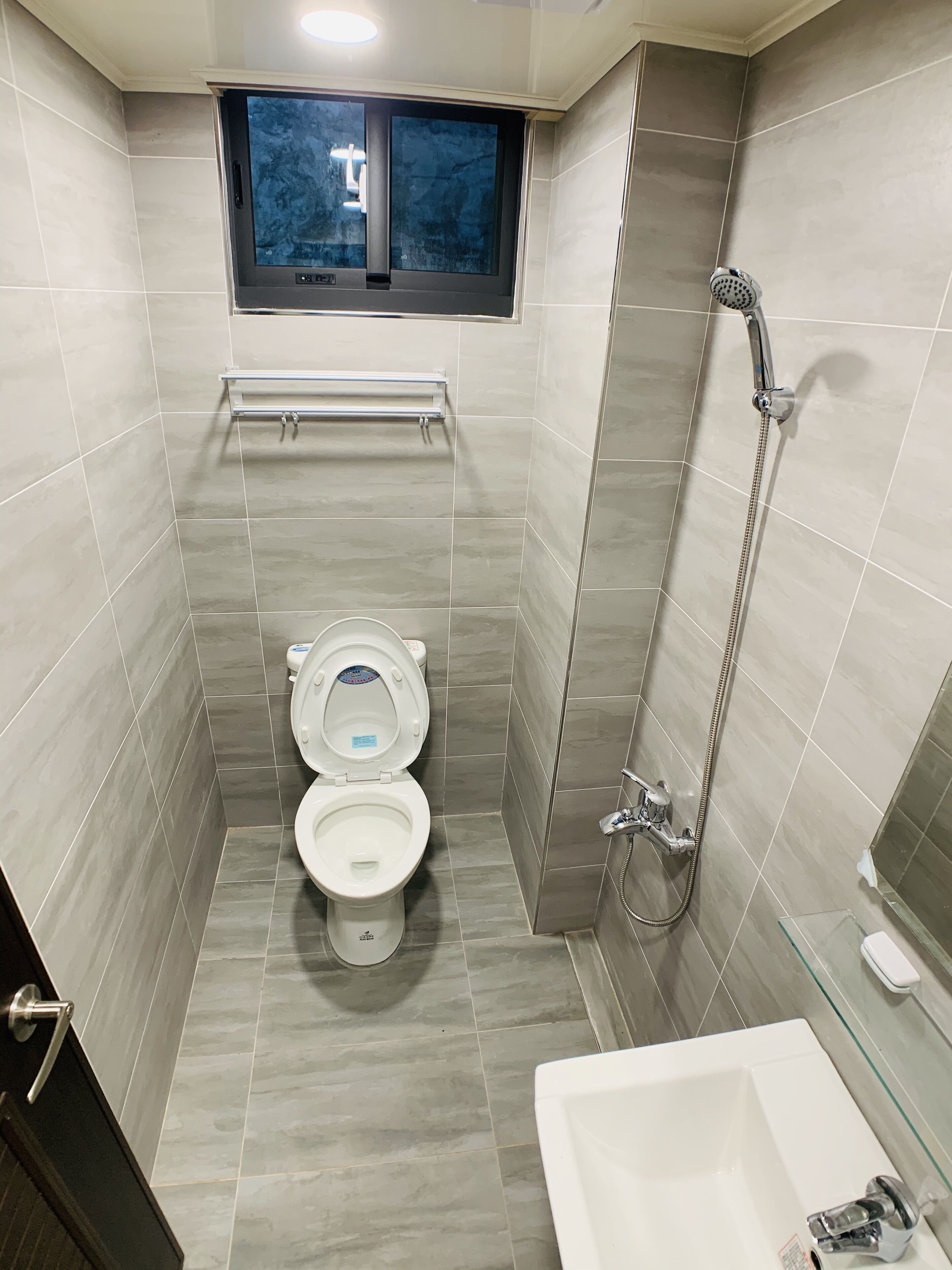 Shower, free toiletries, hair dryer, slippers