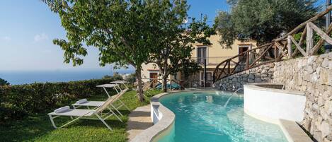 Seasonal outdoor pool, pool umbrellas, pool loungers