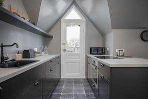 Apartment, 2 Bedrooms | Private kitchen | Full-sized fridge, microwave, oven, stovetop - Suðurgata - Luxury Dream Apartment (Reykjavik)