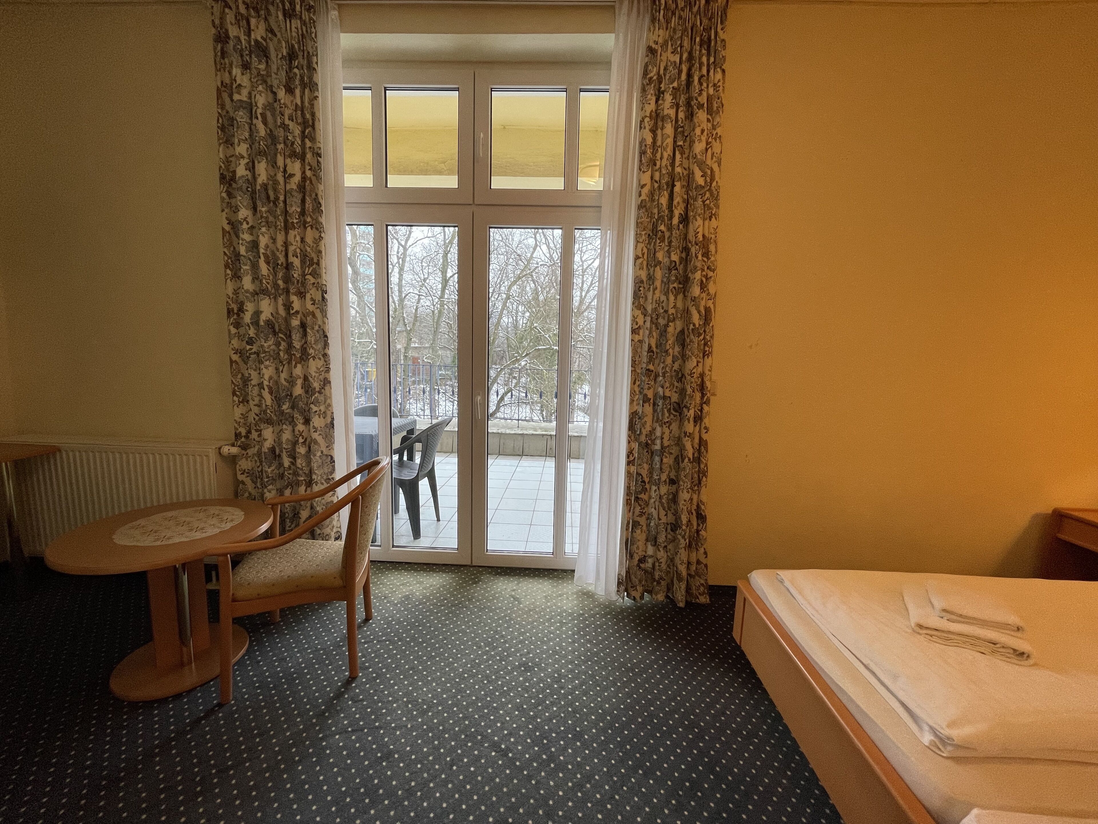 comfort double room, 1 queen bed, non smoking, courtyard view | 1 bedroom, free wifi, bed sheets