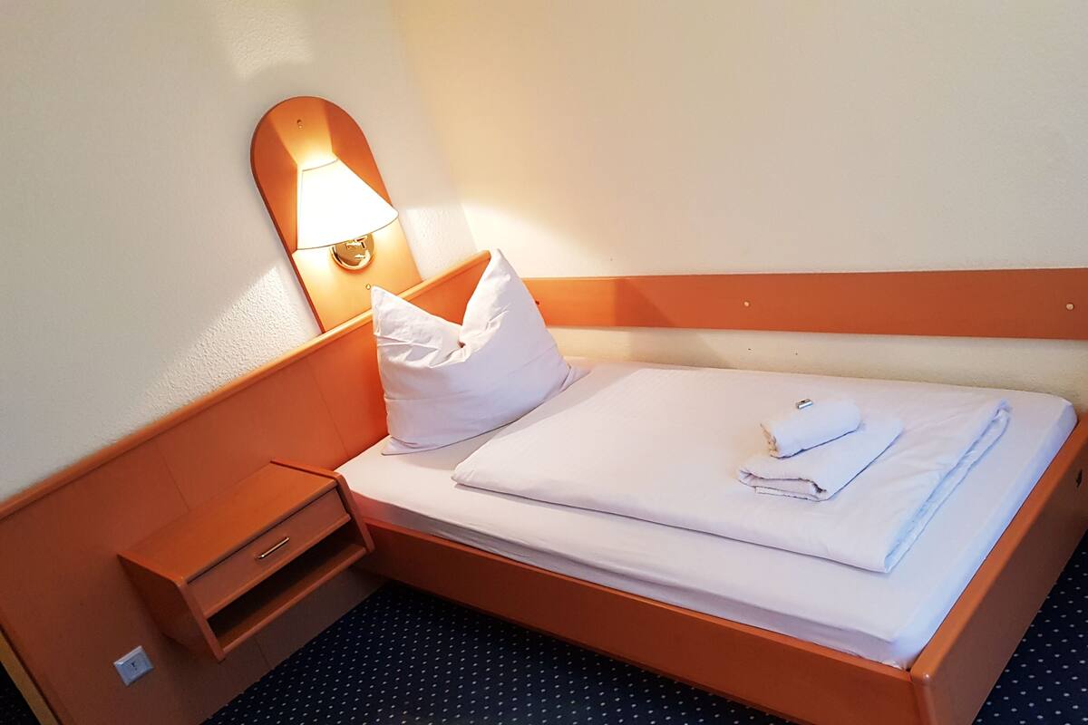 Habitación individual básica | Wifi gratis y ropa de cama