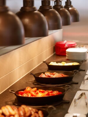 Daily buffet breakfast (USD 22 per person)