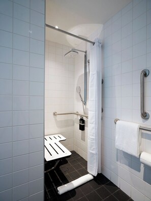 Room, 1 King Bed (Mobility Accessible, Roll-In Shower) | Bathroom | Shower, hydromassage showerhead, eco-friendly toiletries, hair dryer