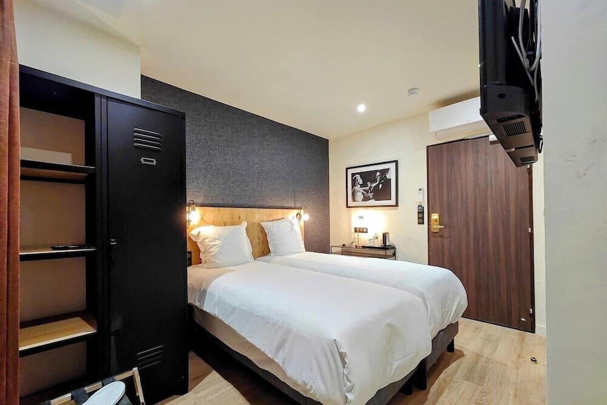Premium bedding, pillow-top beds, in-room safe, individually decorated