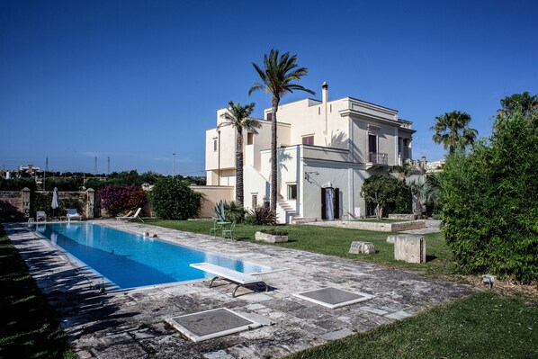 Outdoor pool, pool umbrellas, pool loungers