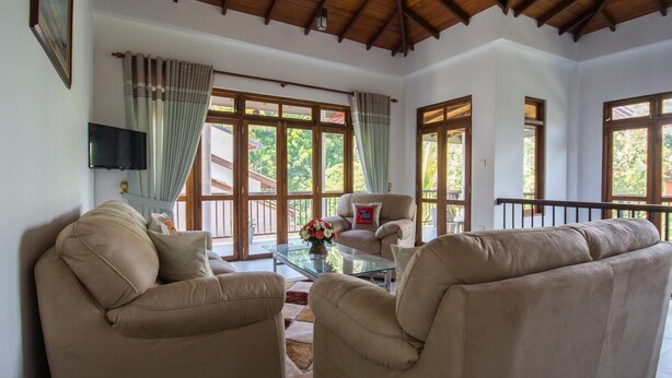 Apartamento Deluxe | Zona de estar