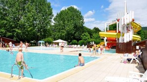 Seasonal outdoor pool, a heated pool, sun loungers