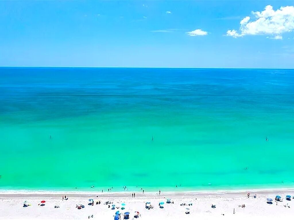 On the beach, sun loungers, beach towels