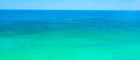 On the beach, sun loungers, beach towels