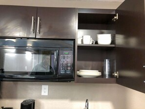 Full-sized fridge, microwave, coffee/tea maker, toaster