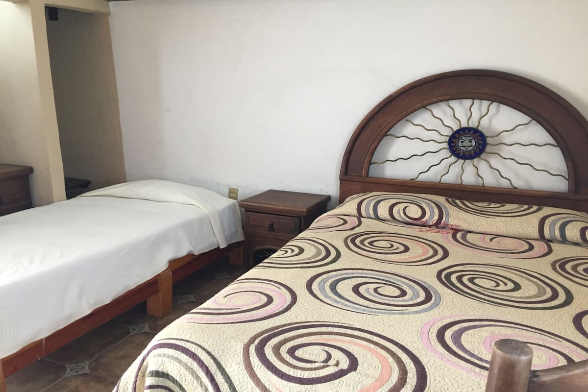 Habitación triple estándar | Wifi gratis y ropa de cama