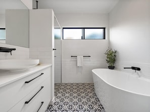 Bathtub, hair dryer, towels