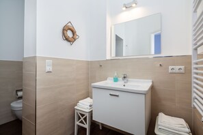 Hair dryer, towels, soap, toilet paper