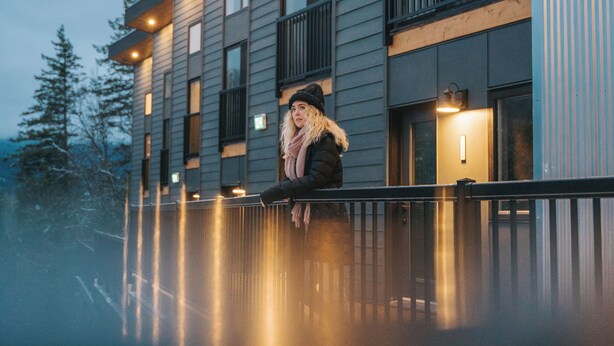 A modern building with multiple balconies and large windows. - Basecamp Resorts Revelstoke (Revelstoke)