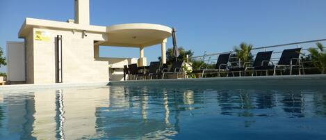 Seasonal outdoor pool, sun loungers