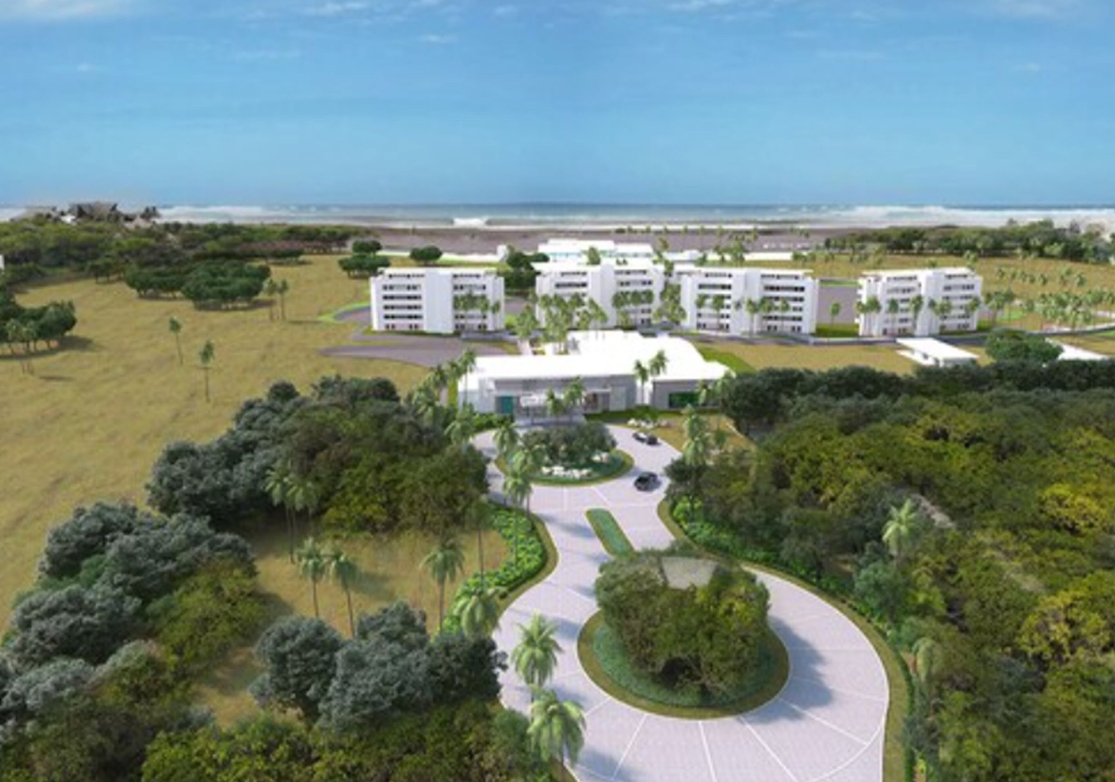 A modern hotel complex with multiple white buildings, surrounded by greenery and a curved road.