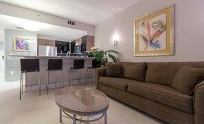 Condo, 1 Bedroom, Balcony, Beachside (908) | Living area | 50-inch flat-screen TV with cable channels, TV - Ocean Walk Resort (Daytona Beach)