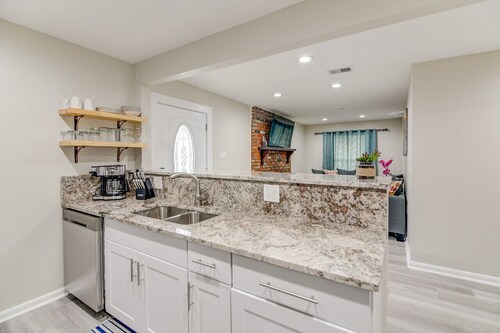 Modern home with 5 bedrooms 2.5 bathroom and  2 full kitchens. 