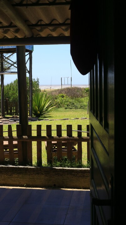 House overlooking the sea a few steps from the beach, with kiosk for events