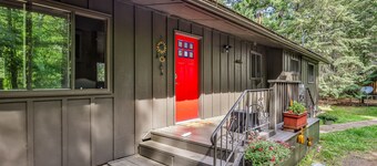 Dog-friendly, lakefront home with dock, kayaks, canoe, bike & fireplace