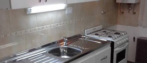 Fridge, microwave, oven, cookware/dishes/utensils