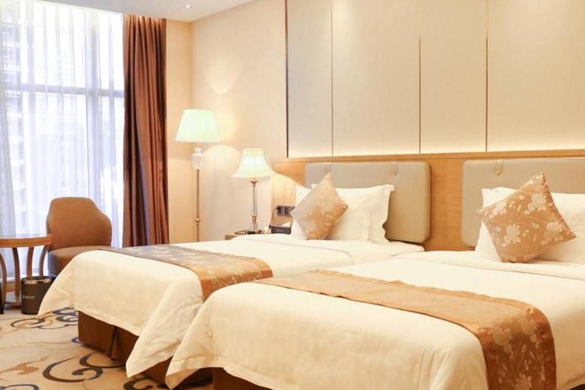 Executive Twin kamer, niet-roken | Een minibar, verduisterende gordijnen, gratis wifi, beddengoed