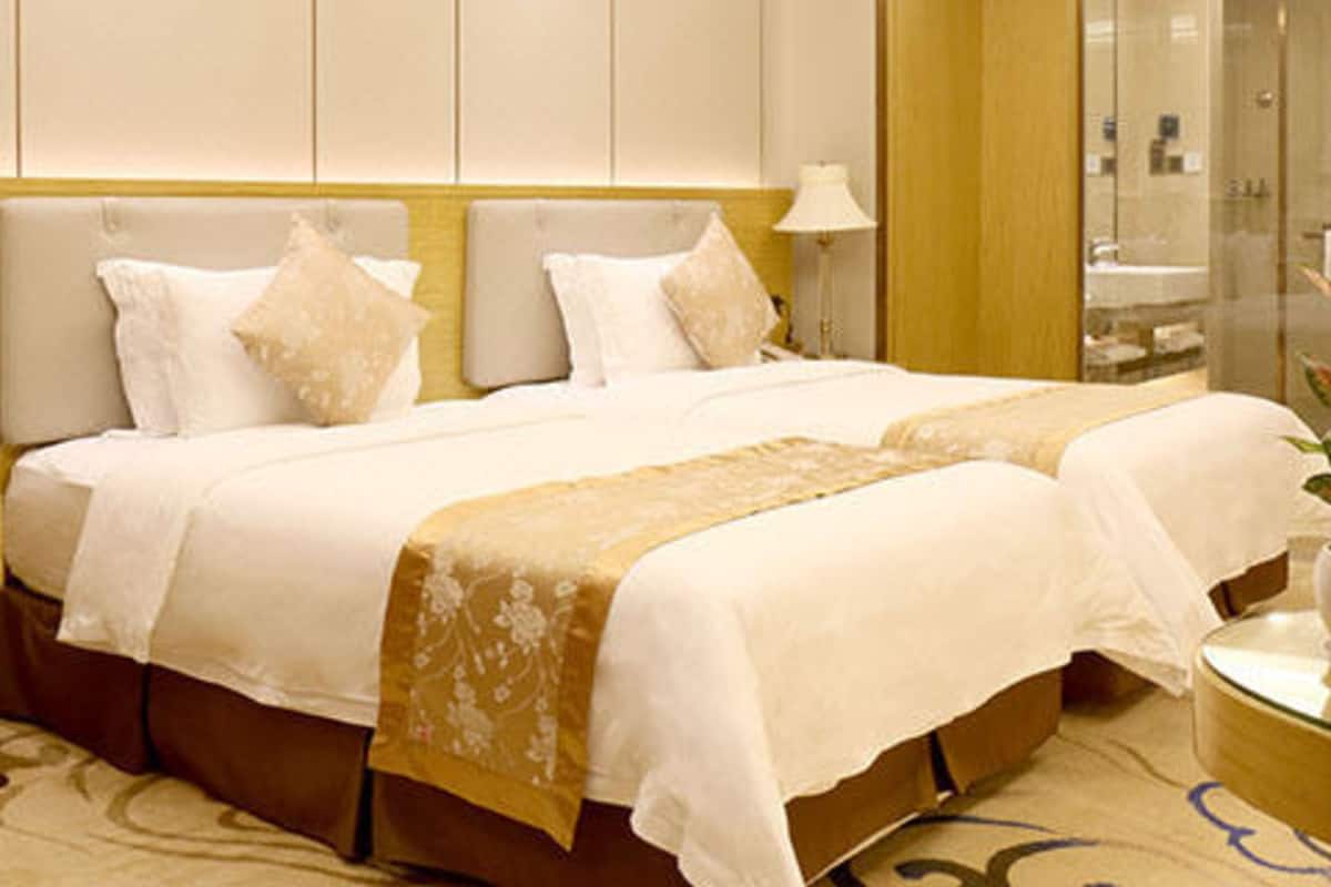Deluxe Twin kamer, niet-roken | Een minibar, verduisterende gordijnen, gratis wifi, beddengoed