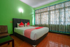 Deluxe Double Room | Desk, free WiFi, bed sheets - OYO 1389 Hotel Carissima (Palembang)