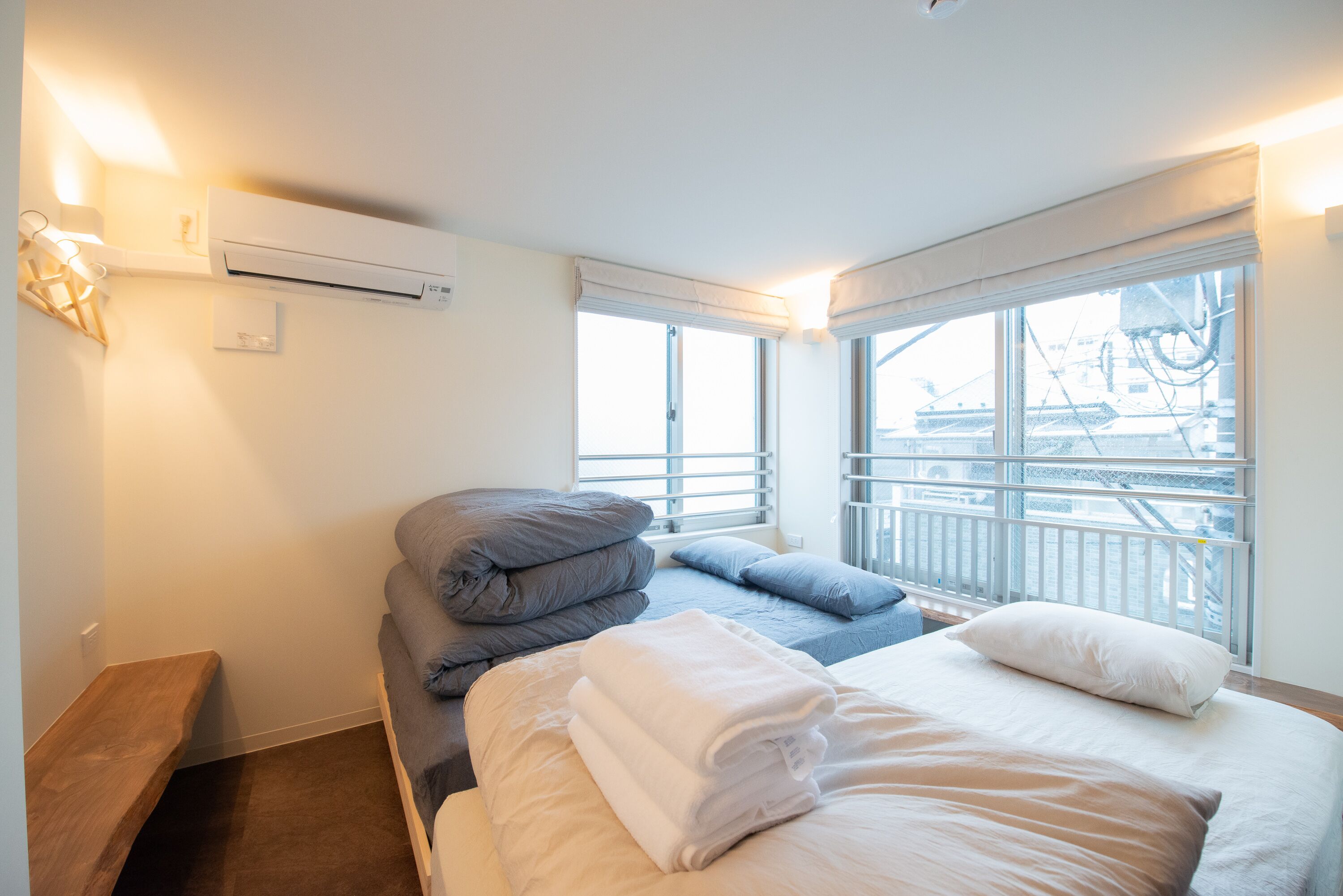 Apartamento família, 2 quartos, para não fumantes, 2 banheiros | Escrivaninha, espaço de trabalho para notebook, cortinas blackout