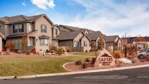 A residential area with multiple houses, a sign for Casitas at Siena Hills, and a road in the foreground. - Poolside Adventures: FREE State and National Parks Passes! (Washington)