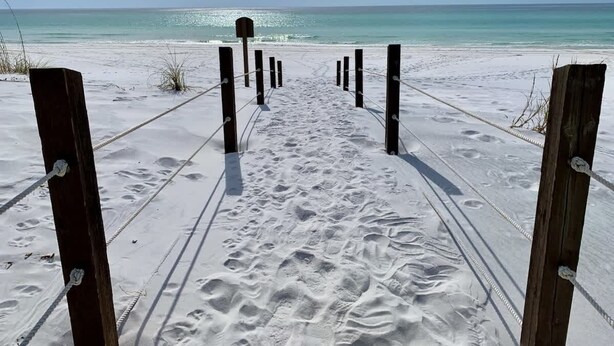A sandy beach path leading to the ocean, with wooden posts and ropes guiding the way. - 30A Beachfront and State Park Views, Gulf Trace (Santa Rosa Beach)