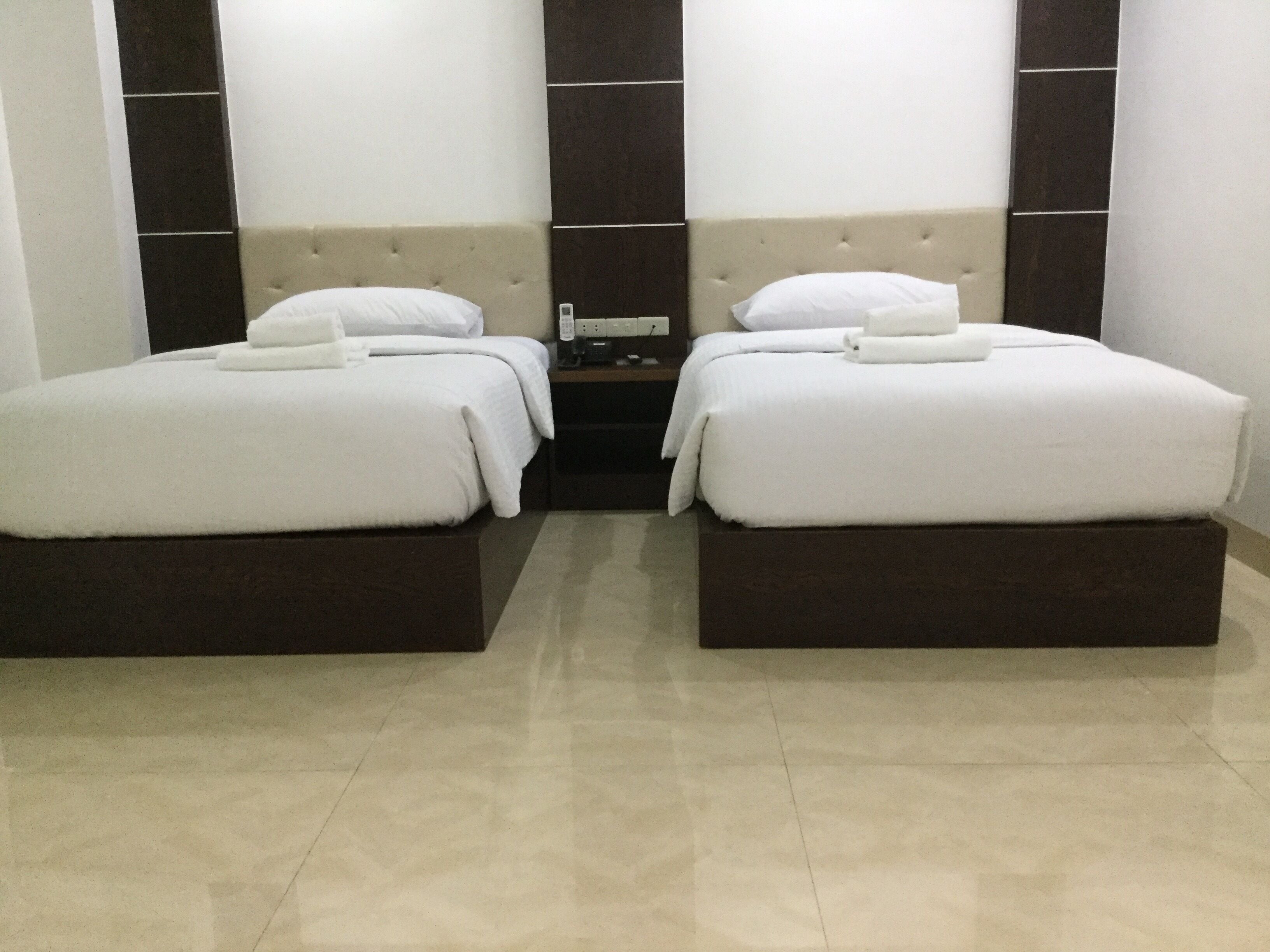 standard double or twin room | premium bedding, down duvets, desk, laptop workspace